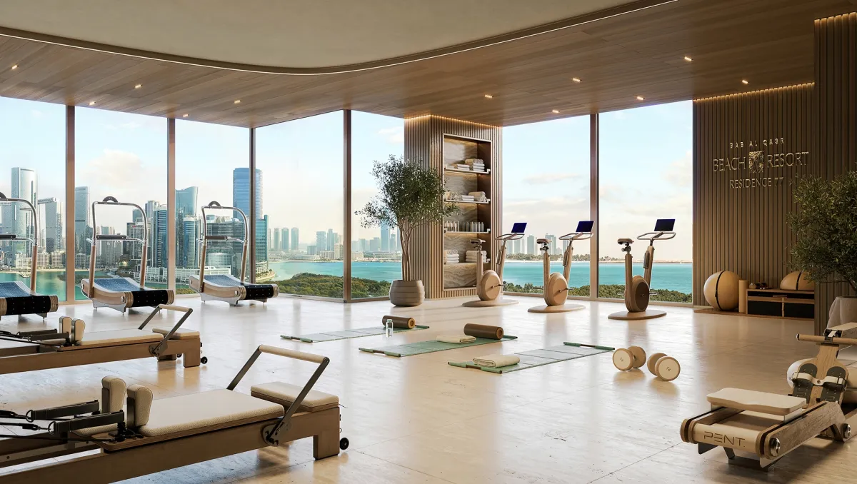 Fitness studio with sea and skyline views at Bab Al Qasr Residence 77
