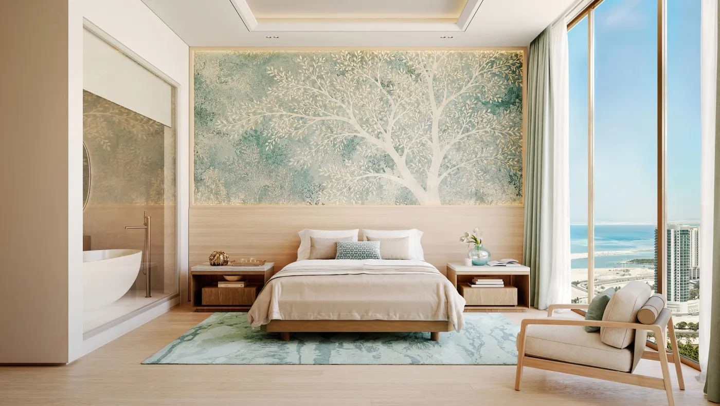 Master bedroom with a freestanding bath and sea views at Bab Al Qasr Residence 77