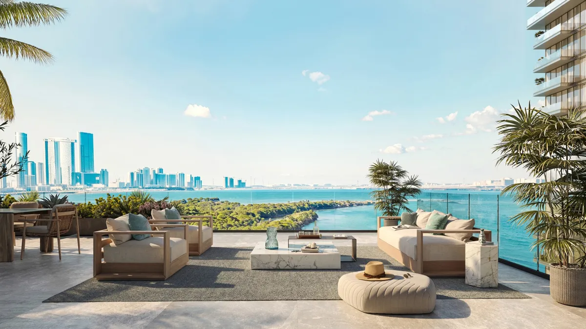 Penthouse terrace lounge overlooking the sea and the Abu Dhabi skyline at Bab Al Qasr Residence 77